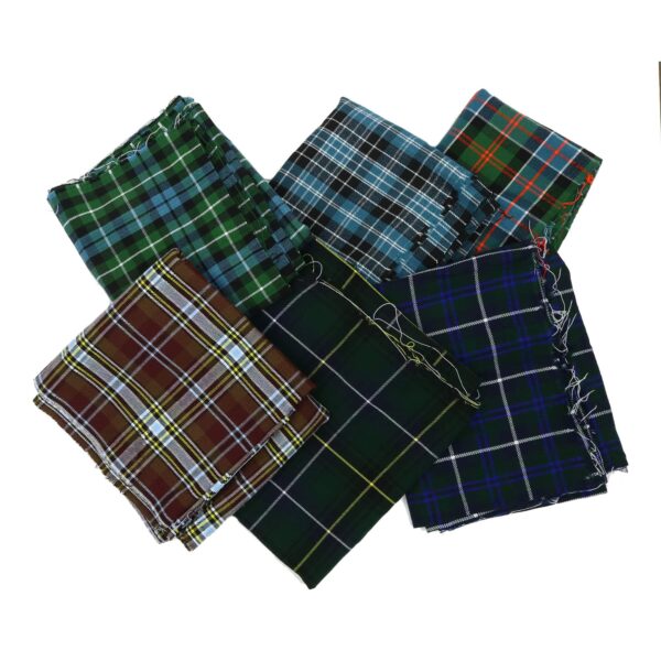 A group of Black Watch Modern Homespun Wool Blend Tartan REMNANTS on a white background.